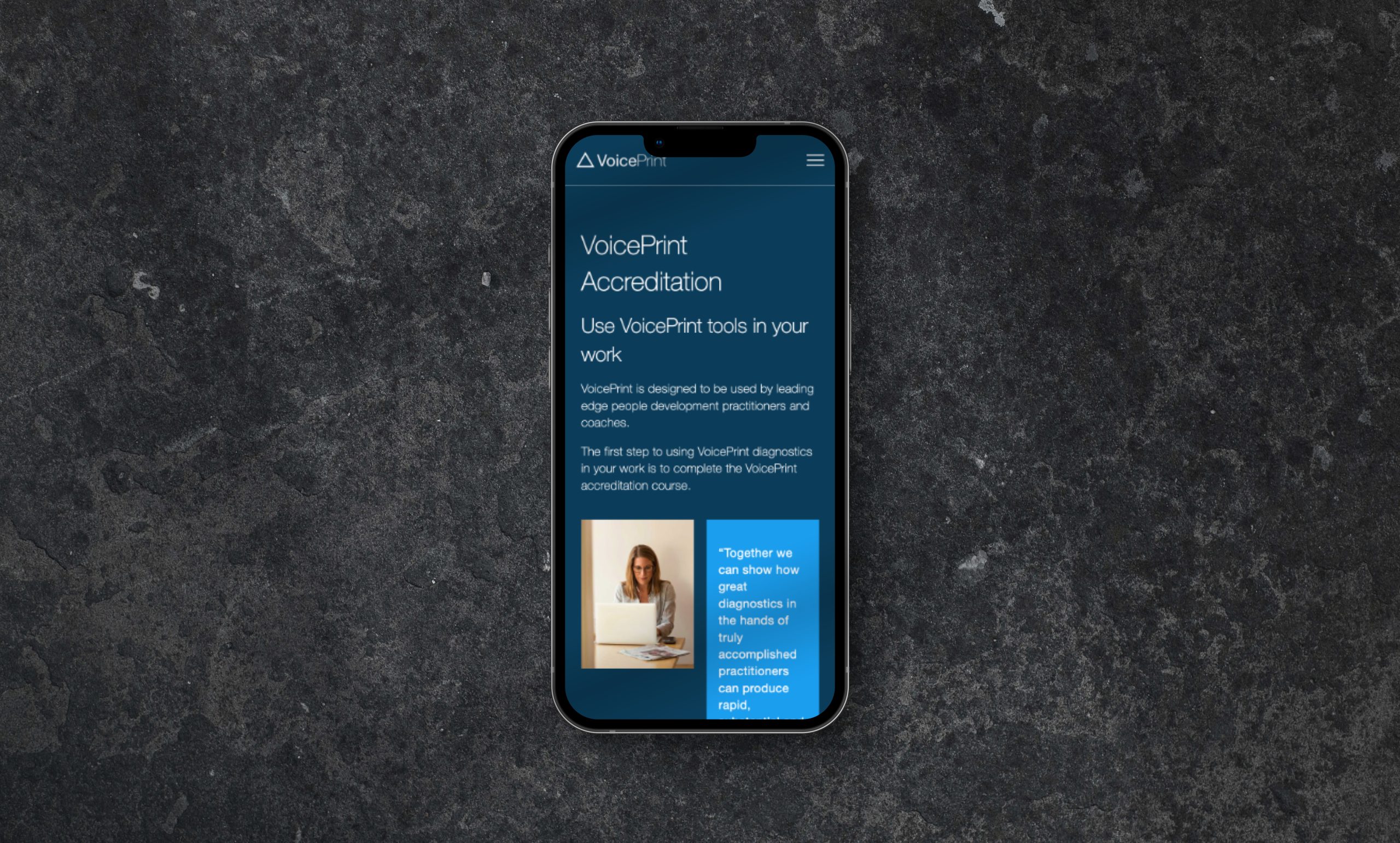 Mobile Mockup on Black Counter of VoicePrint Website by Consider